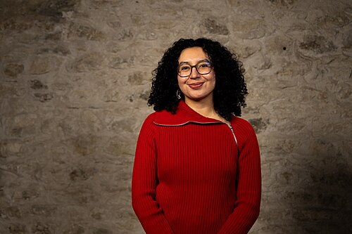 Laura Godinez, Software engineer, at the WikiPortraits studio at the 2025 SXSW Festival.