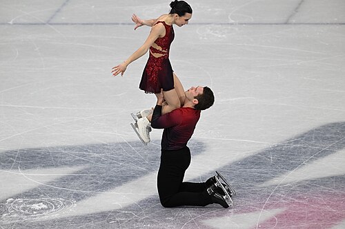 MILAN, ITALY - 15 FEBRUARY 2026: Lia Pereira and Trennt Michaud of Canada compete during the Figure Skating Pair Skating Short Program at the Olympic Winter Games Milano Cortina 2026 Milano Ice Skating Arena on February 15, 2026 in Milan, Italy