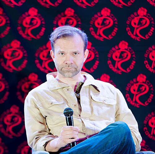 Liam O'Brien on the main stage at Rose City Comic Con