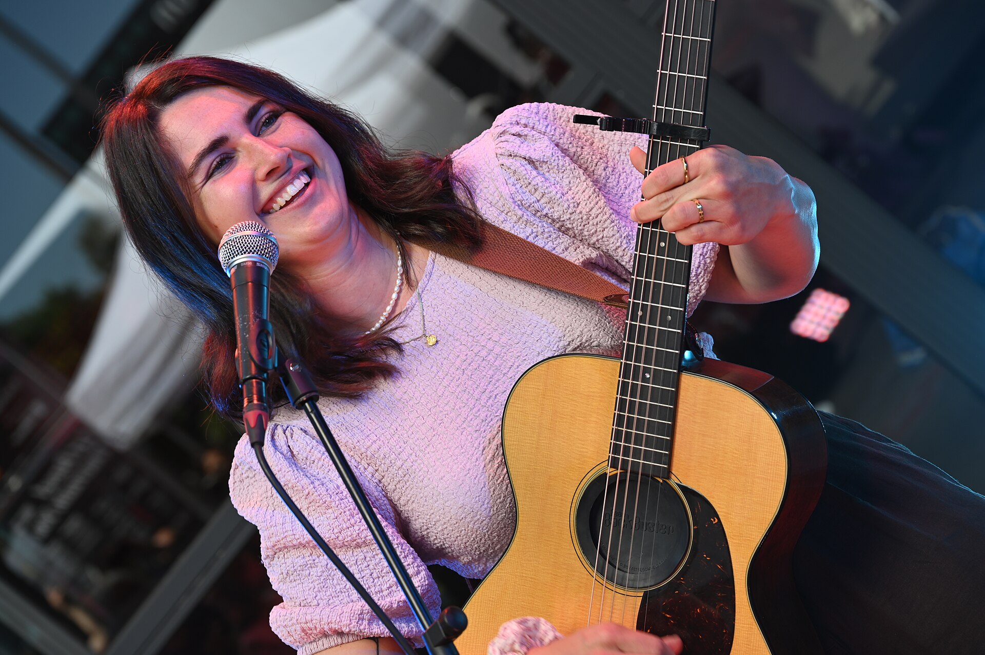 Linda Elys performing in the 2025 Eurovision Village in Basel, Switzerland