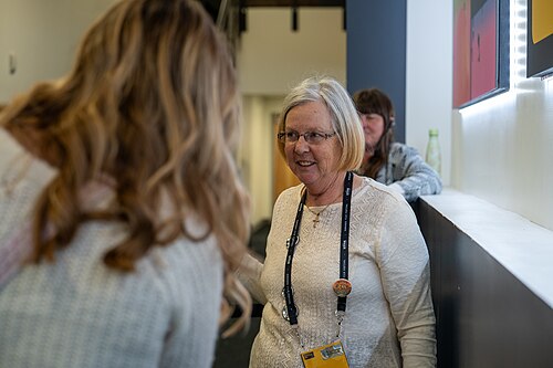 Lisa Rajigah handing out raffle prizes to audience members at Sundance Film Festival 2026