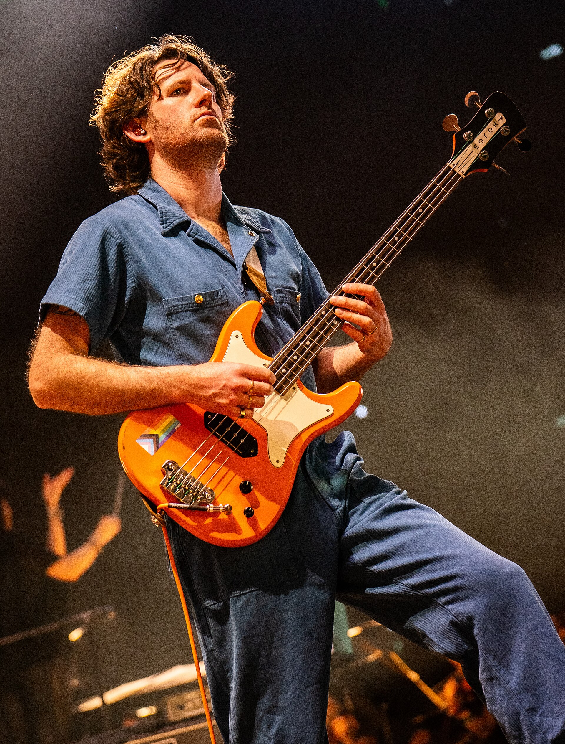 Lucas Harwood performing with King Gizzard & The Lizard Wizard and the National Symphony Orchestra, conducted by Sarah Hicks on the Phantom Island tour at Merriweather Post Pavilion in 2025.