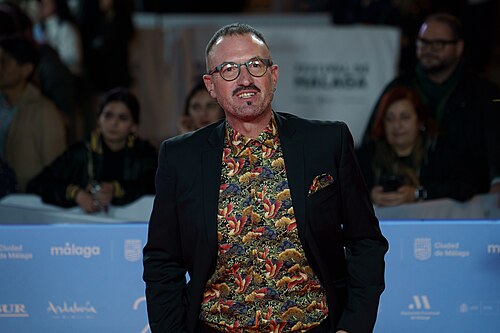 Álex O'Dogherty at the Red Carpet of the Malaga 2025 Festival next to Cervantes Theater