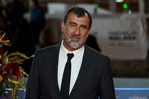 Adolfo Dávila at the Red Carpet of the Malaga 2025 Festival next to Cervantes Theater