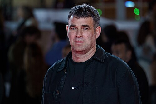 Asier Urbieta at the Red Carpet of the Malaga 2025 Festival next to Cervantes Theater