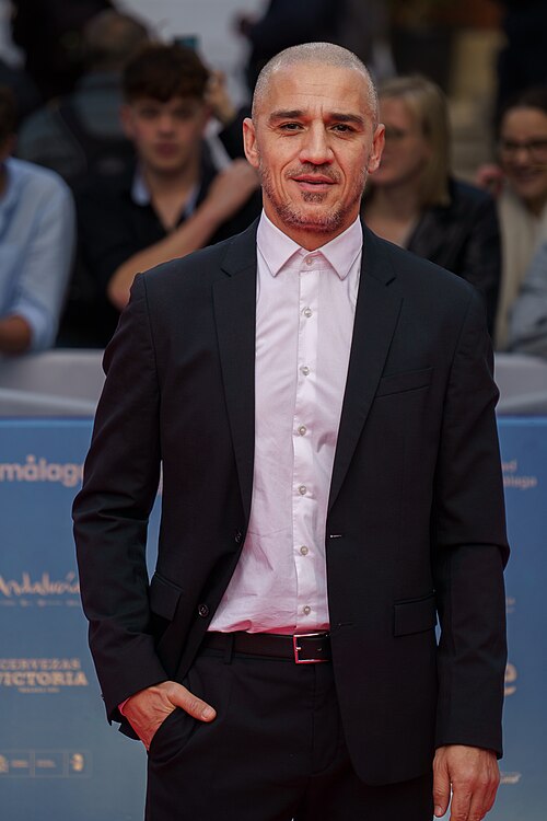 Carlos Librado at the Red Carpet of the Malaga 2025 Festival next to Cervantes Theater