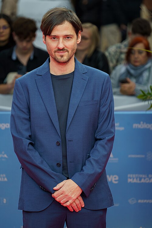 Carlos Marqués-Marcet at the Red Carpet of the Malaga 2025 Festival next to Cervantes Theater