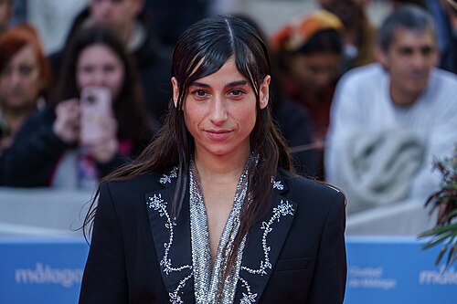 Carolina Yuste at the Red Carpet of the Malaga 2025 Festival next to Cervantes Theater