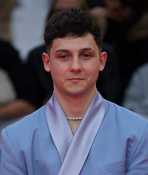 Christian Checa at the Red Carpet of the Malaga 2025 Festival next to Cervantes Theater