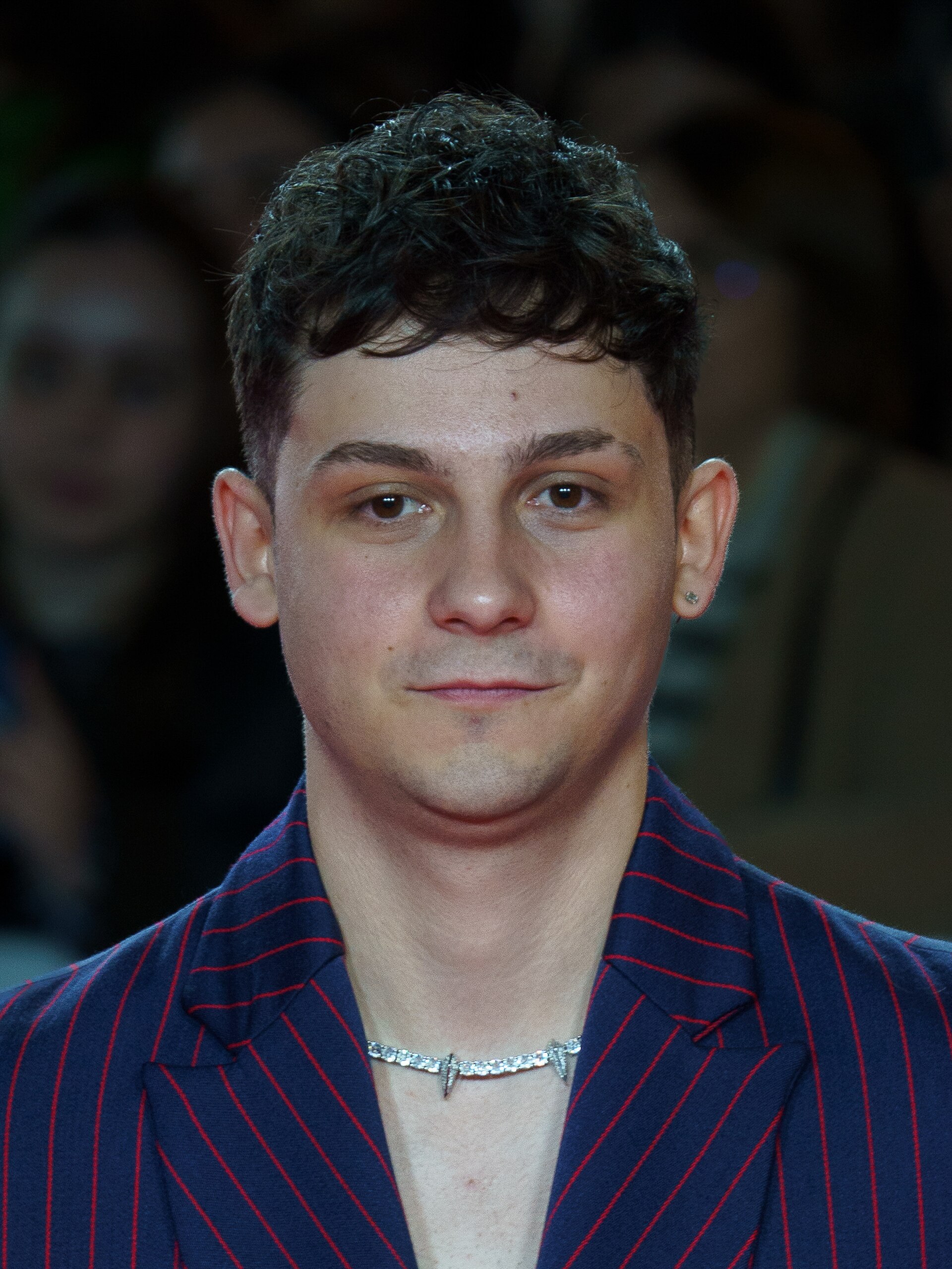 Christian Checa at the Red Carpet of the Malaga 2025 Festival next to Cervantes Theater