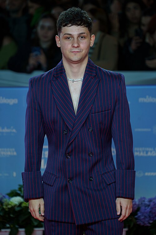 Christian Checa at the Red Carpet of the Malaga 2025 Festival next to Cervantes Theater