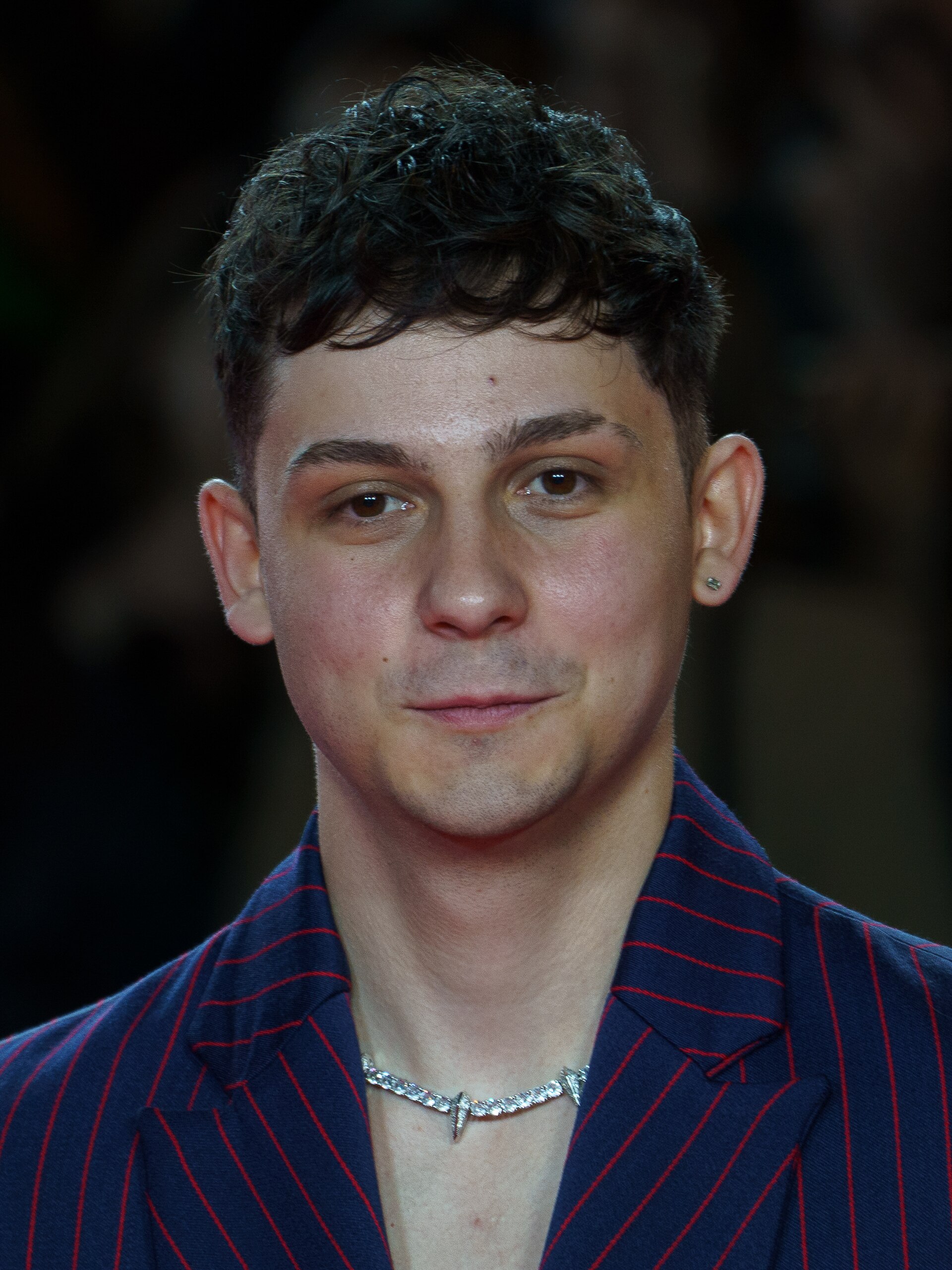 Christian Checa at the Red Carpet of the Malaga 2025 Festival next to Cervantes Theater