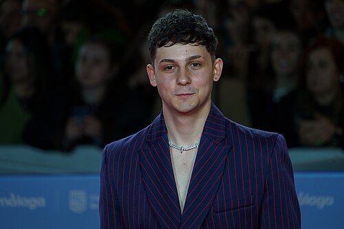 Christian Checa at the Red Carpet of the Malaga 2025 Festival next to Cervantes Theater