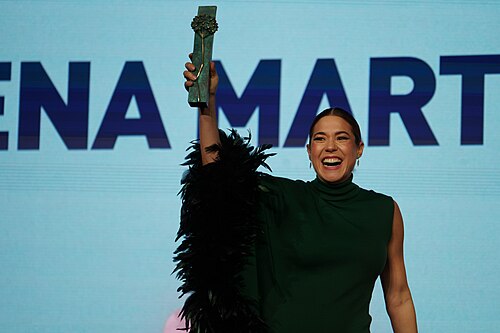 Elena Martínez receiving the Biznaga Málaga Cinema Award at the Cervantes Theater
