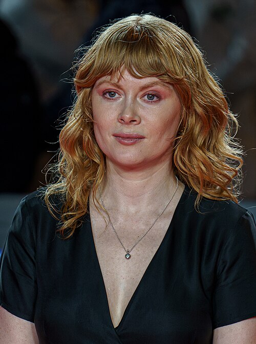 Emily Beecham at the Red Carpet of the Malaga 2025 Festival next to Cervantes Theater