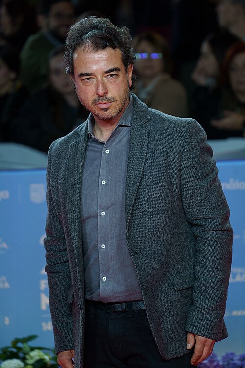 Enrique Palacios at the Red Carpet of the Malaga 2025 Festival next to Cervantes Theater