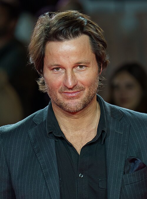 Fernando Andina at the Red Carpet of the Malaga 2025 Festival next to Cervantes Theater