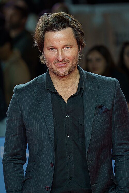 Fernando Andina at the Red Carpet of the Malaga 2025 Festival next to Cervantes Theater