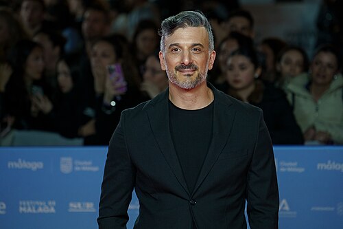 Gabriel Nesci at the Red Carpet of the Malaga 2025 Festival next to Cervantes Theater