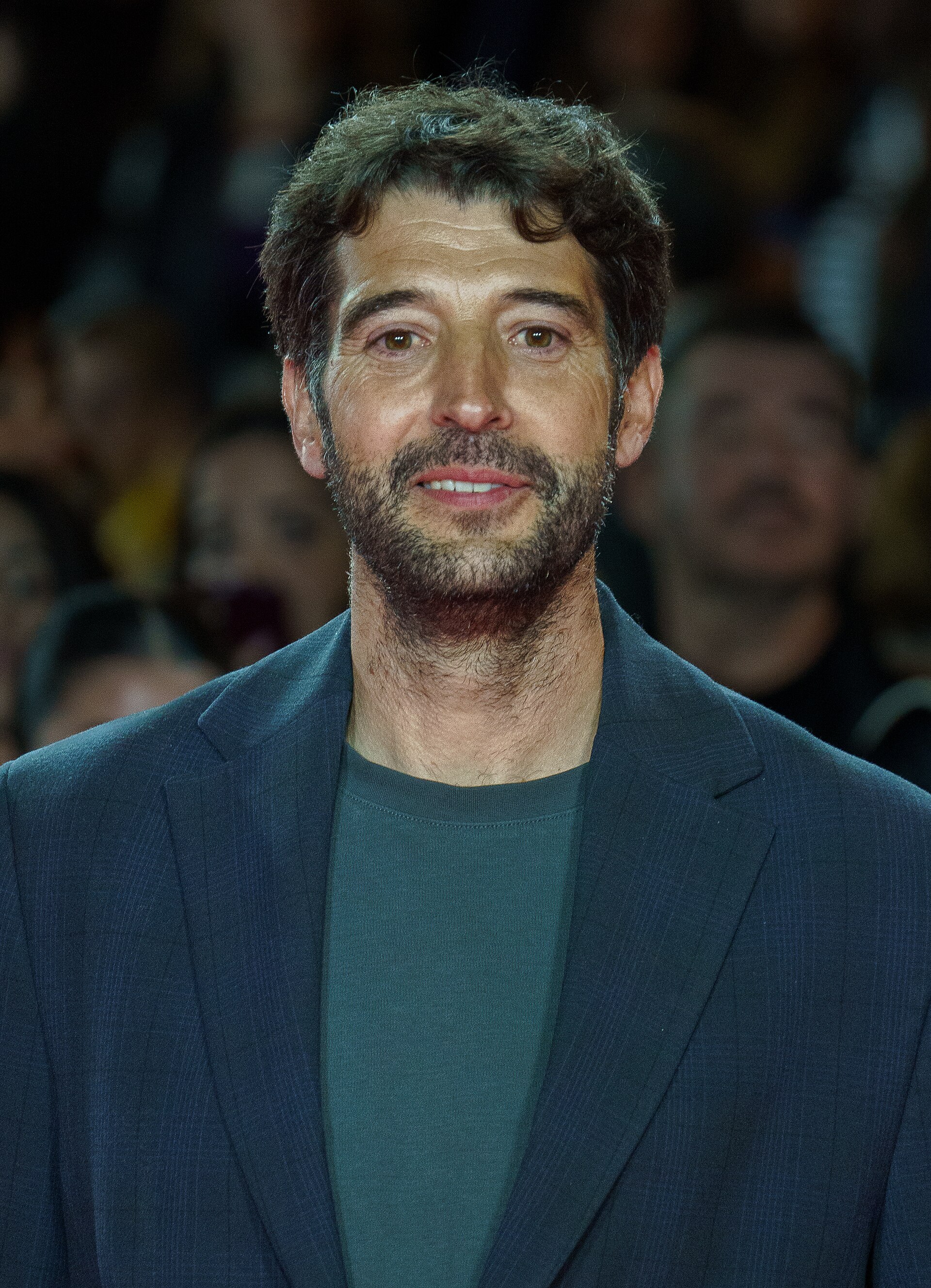 Gerand Oms at the Red Carpet of the Malaga 2025 Festival next to Cervantes Theater