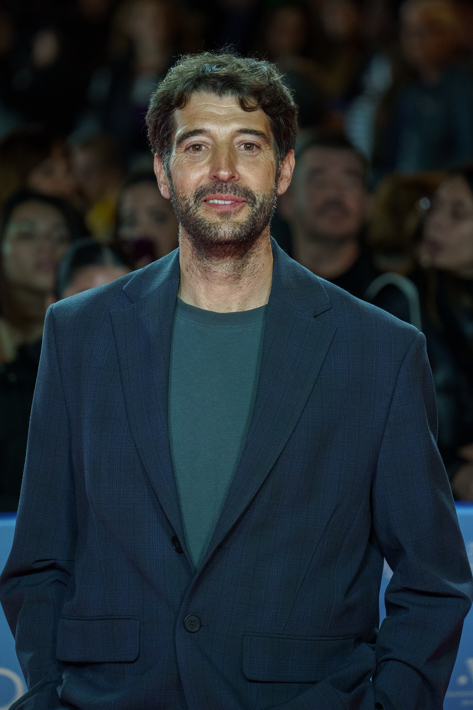 Gerand Oms at the Red Carpet of the Malaga 2025 Festival next to Cervantes Theater