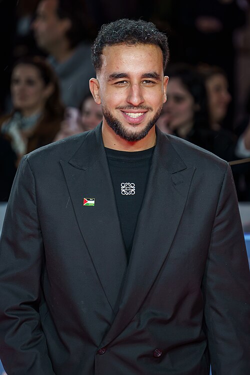 Hamza at the Red Carpet of the Malaga 2025 Festival next to Cervantes Theater