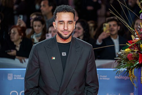 Hamza at the Red Carpet of the Malaga 2025 Festival next to Cervantes Theater