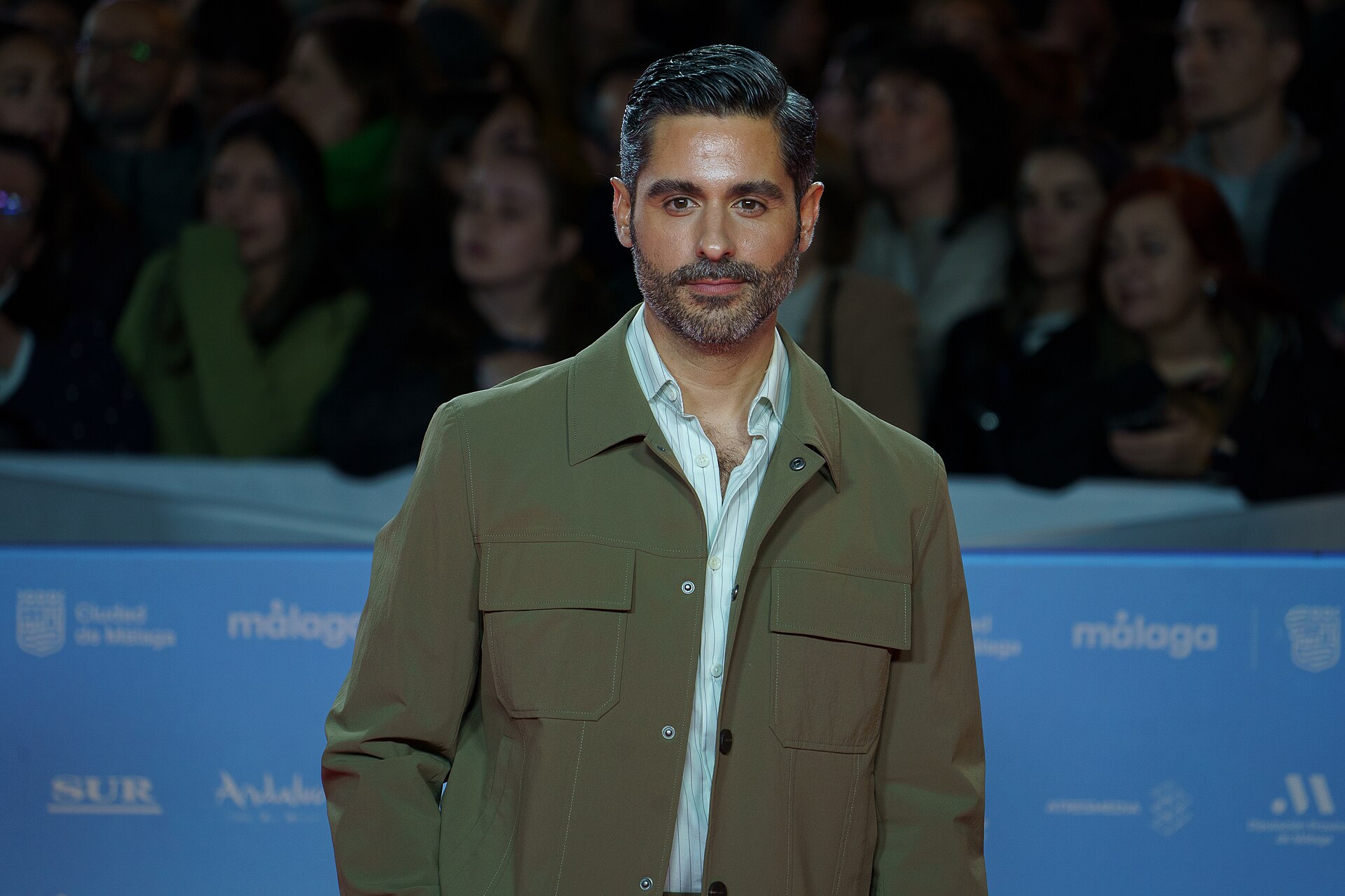 Miguel Diosdado at the Red Carpet of the Malaga 2025 Festival next to Cervantes Theater