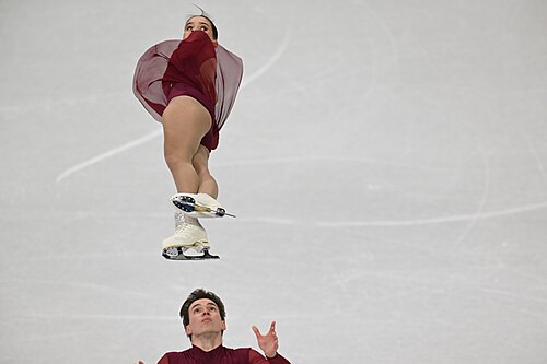 MILAN, ITALY - 15 FEBRUARY 2026: Maria Pavlova and Alexei Sviatchenko of Hungary compete during the Figure Skating Pair Skating Short Program at the Olympic Winter Games Milano Cortina 2026 Milano Ice Skating Arena on February 15, 2026 in Milan, Italy