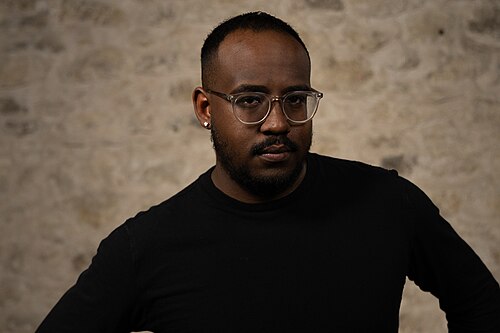 Mark McCutcheon, Teacher, at the WikiPortraits studio at the 2025 SXSW Festival.