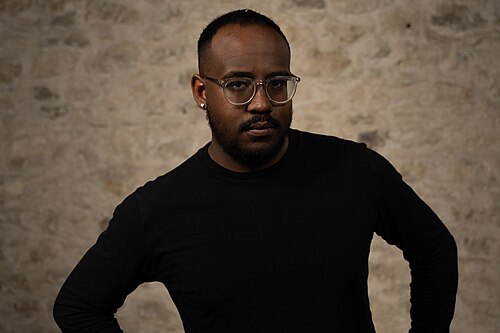 Mark McCutcheon, Teacher, at the WikiPortraits studio at the 2025 SXSW Festival.
