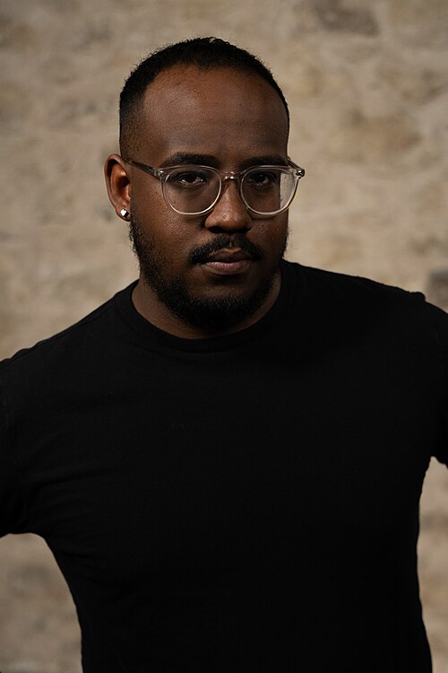 Mark McCutcheon, Teacher, at the WikiPortraits studio at the 2025 SXSW Festival.