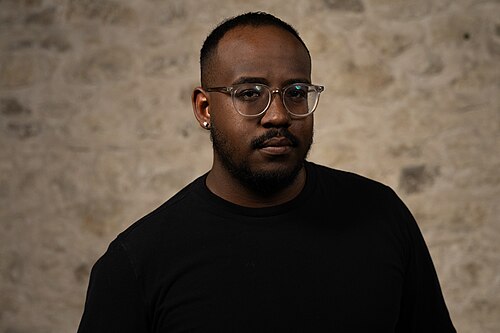 Mark McCutcheon, Teacher, at the WikiPortraits studio at the 2025 SXSW Festival.