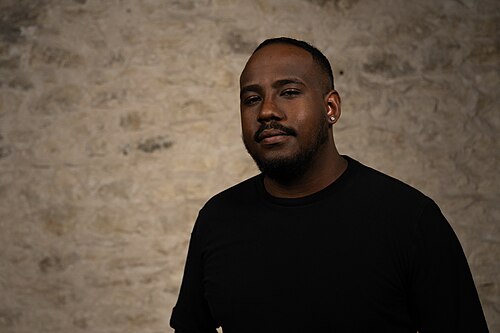 Mark McCutcheon, Teacher, at the WikiPortraits studio at the 2025 SXSW Festival.