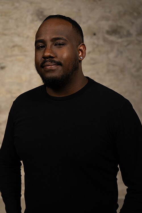 Mark McCutcheon, Teacher, at the WikiPortraits studio at the 2025 SXSW Festival.