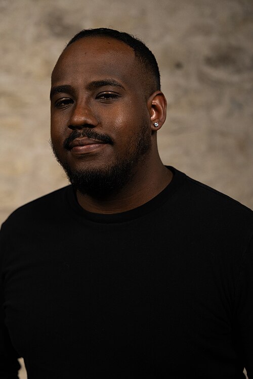 Mark McCutcheon, Teacher, at the WikiPortraits studio at the 2025 SXSW Festival.