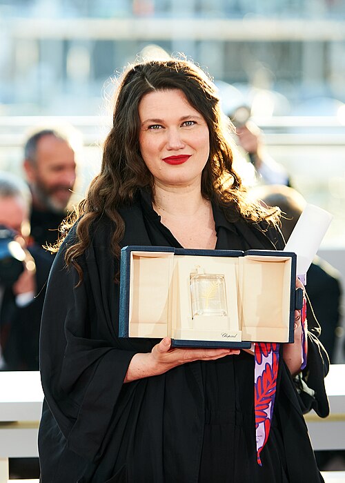 Mascha Schilinski stands with the Jury Prize for "Sound of Falling" during the 2025 Cannes Film Festival