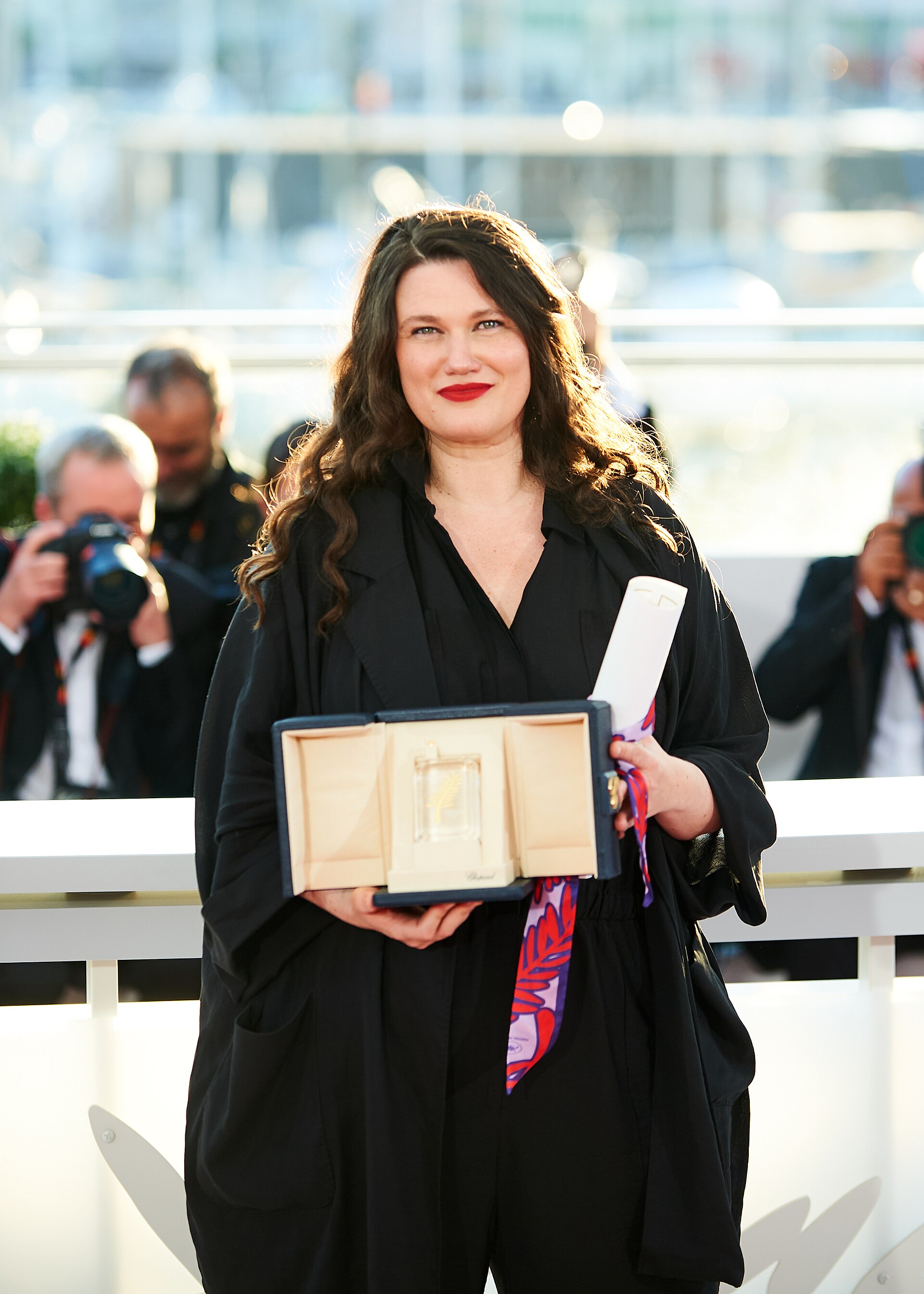 Mascha Schilinski stands with the Jury Prize for "Sound of Falling" during the 2025 Cannes Film Festival