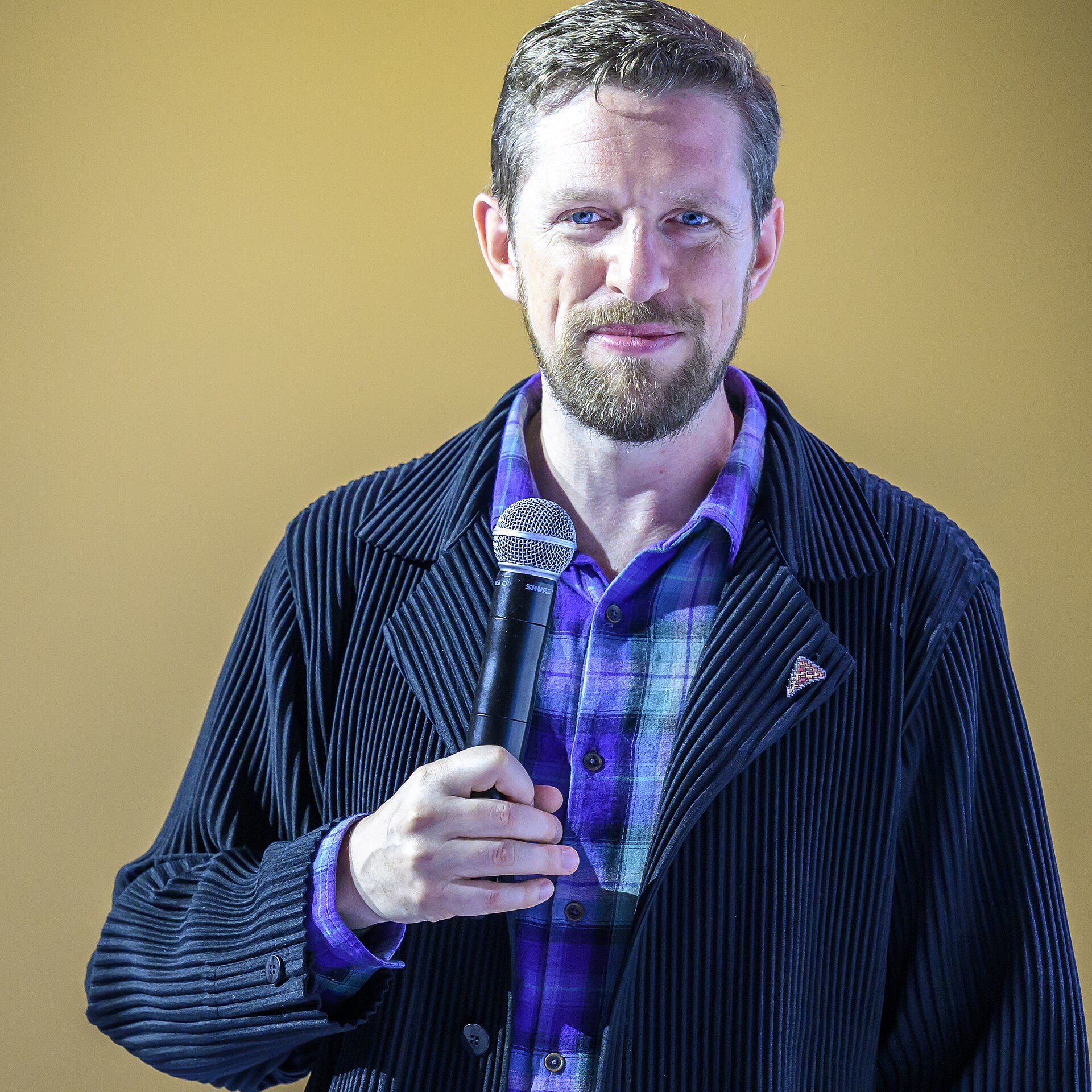 Matt Mullenweg speaking at WordCamp Torino in 2024