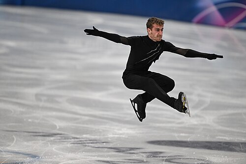MILAN, ITALY - 10 FEBRUARY 2026: Matteo Rizzo of Italy competes during the Figure Skating Men Single Skating Short Program at the Olympic Winter Games Milano Cortina 2026 Milano Ice Skating Arena on February 10, 2026 in Milan, Italy