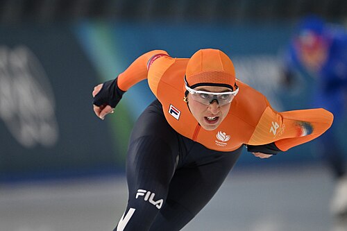 MILAN, ITALY - 09 FEBRUARY 2026: Maybritt Vigl of team Italy and Suzanne Schulting of team Netherlands compete during the Speed Skating Women's 1000m at the Olympic Winter Games Milano Cortina 2026  Milano Ice Skating Arena on February 09, 2026 in Milan, Italy