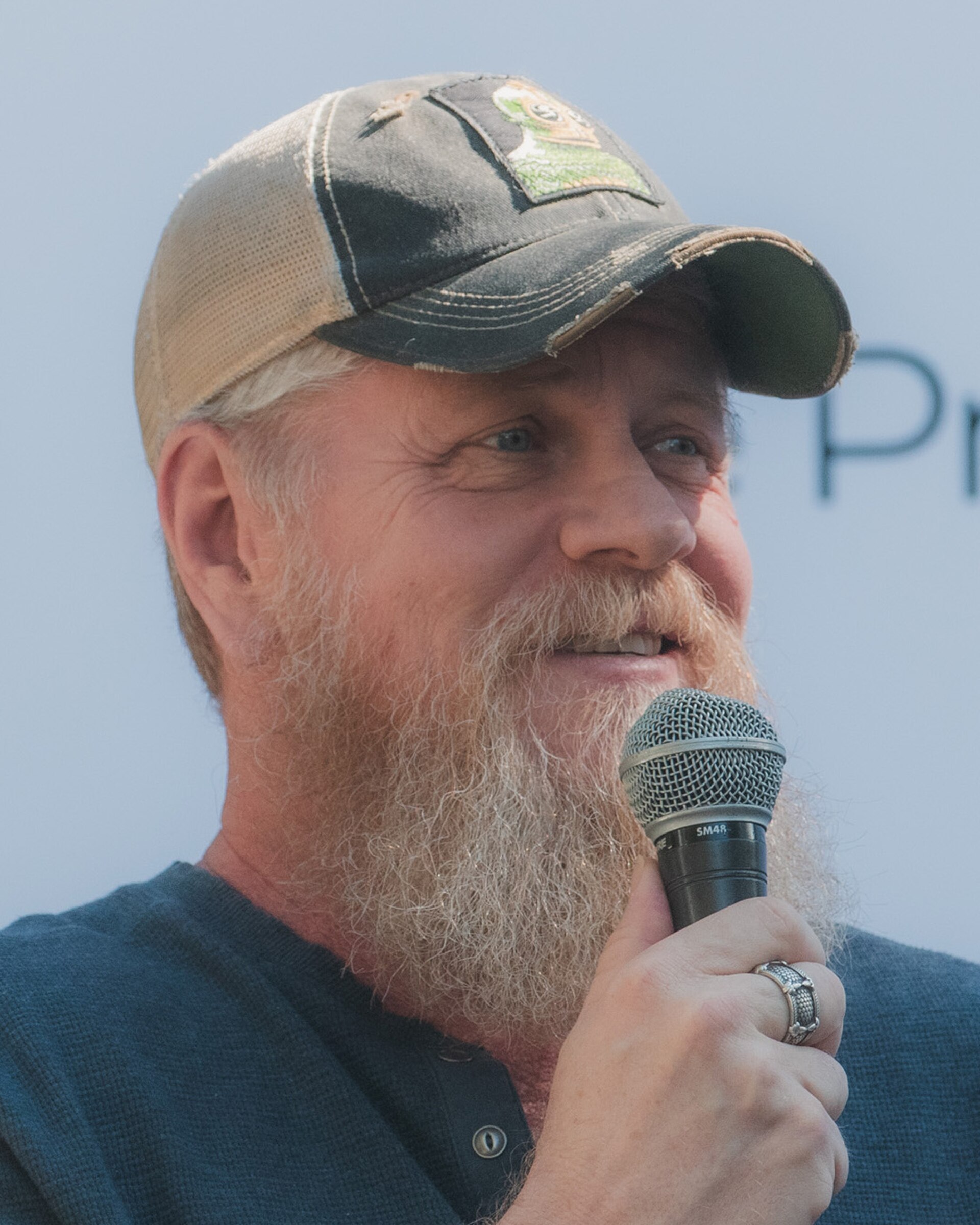 Michael Cudlitz speaking at MultiCon 2025 in Los Angeles, California.