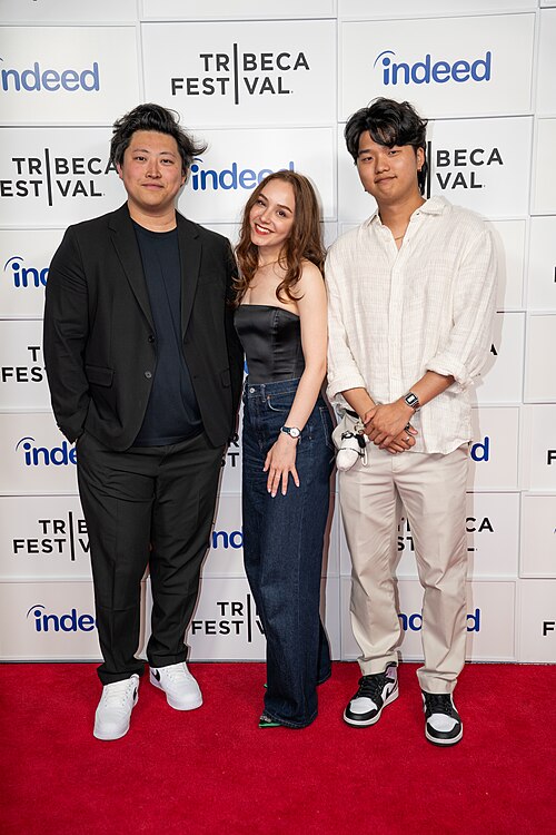 Michael Ren, Anastasia Itkina, and Kevin Jin Kwan Kim, , at a 2025 Tribeca Film Festival red carpet in New York City for the film My Dad, the Rockstar.
