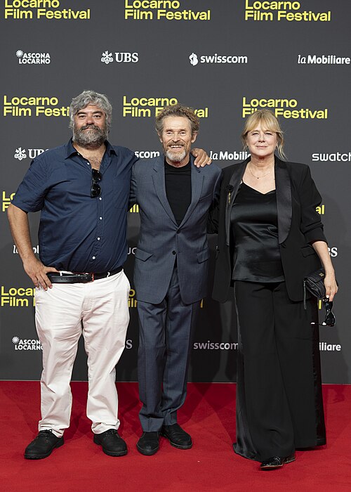 Director Miguel Ángel Jiménez, actor Willem Dafoe and actress Emma Suárez at 78th Locarno Film Festival red carpet for The Birthday Party