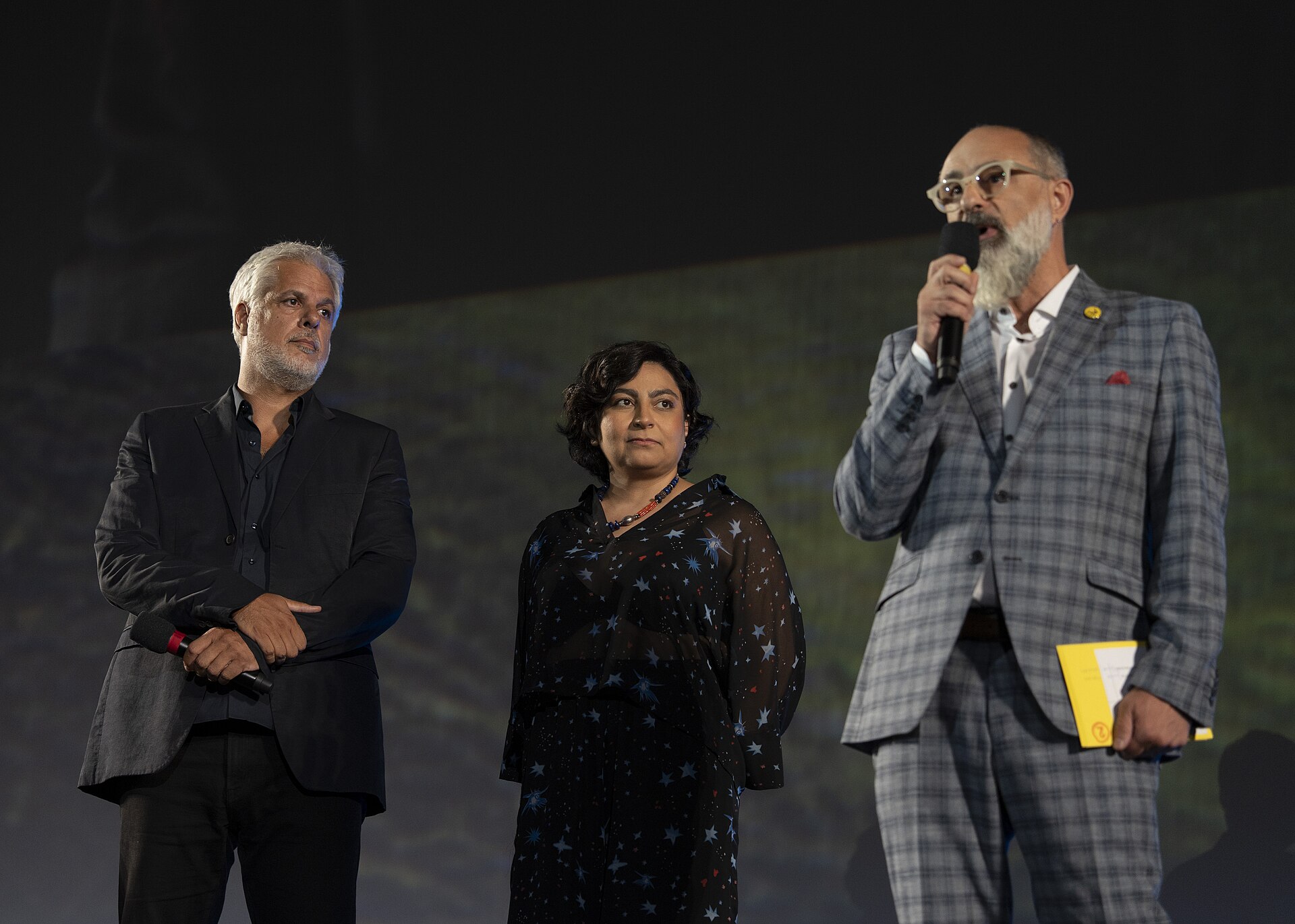 Director Miguel Ángel Jiménez, actor Willem Dafoe and actress Emma Suárez at 78th Locarno Film Festival red carpet for The Birthday Party