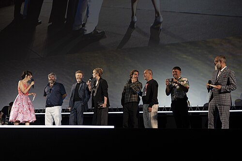 Director Miguel Ángel Jiménez, actor Willem Dafoe and actress Emma Suárez at 78th Locarno Film Festival red carpet for The Birthday Party