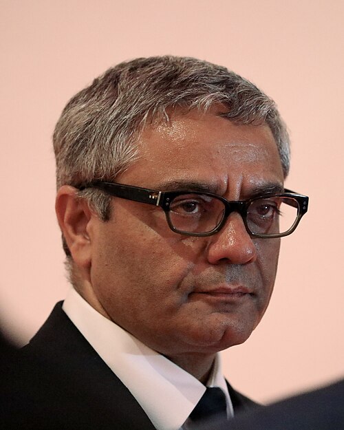 Mohammad Rasoulof at the 2024 Cannes Film Festival closing press conference for his film The Seed of the Sacred Fig.