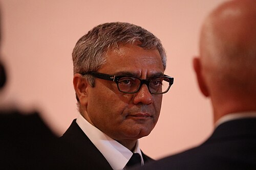 Mohammad Rasoulof at the 2024 Cannes Film Festival closing press conference for his film The Seed of the Sacred Fig.