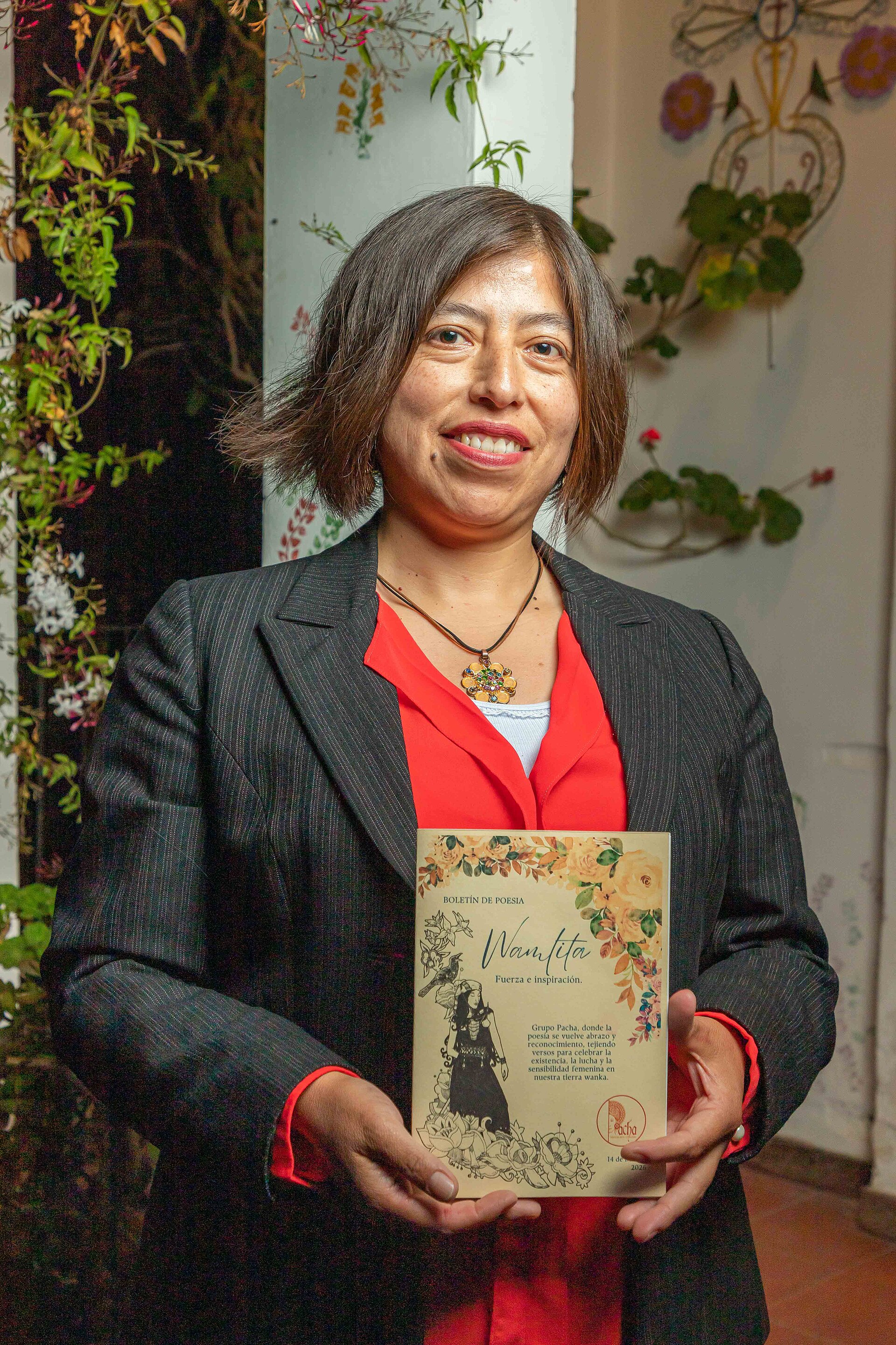 Mylena Coz integrante de PACHA Grupo de Arte y Literatura, durante Segunda edición de Wamlita - Reconocimiento a la mujer. Realizado el 14 de marzo de 2026, Huancayo, Perú.