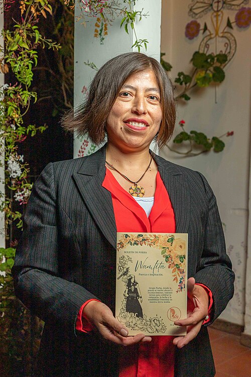 Mylena Coz integrante de PACHA Grupo de Arte y Literatura, durante Segunda edición de Wamlita - Reconocimiento a la mujer. Realizado el 14 de marzo de 2026, Huancayo, Perú.